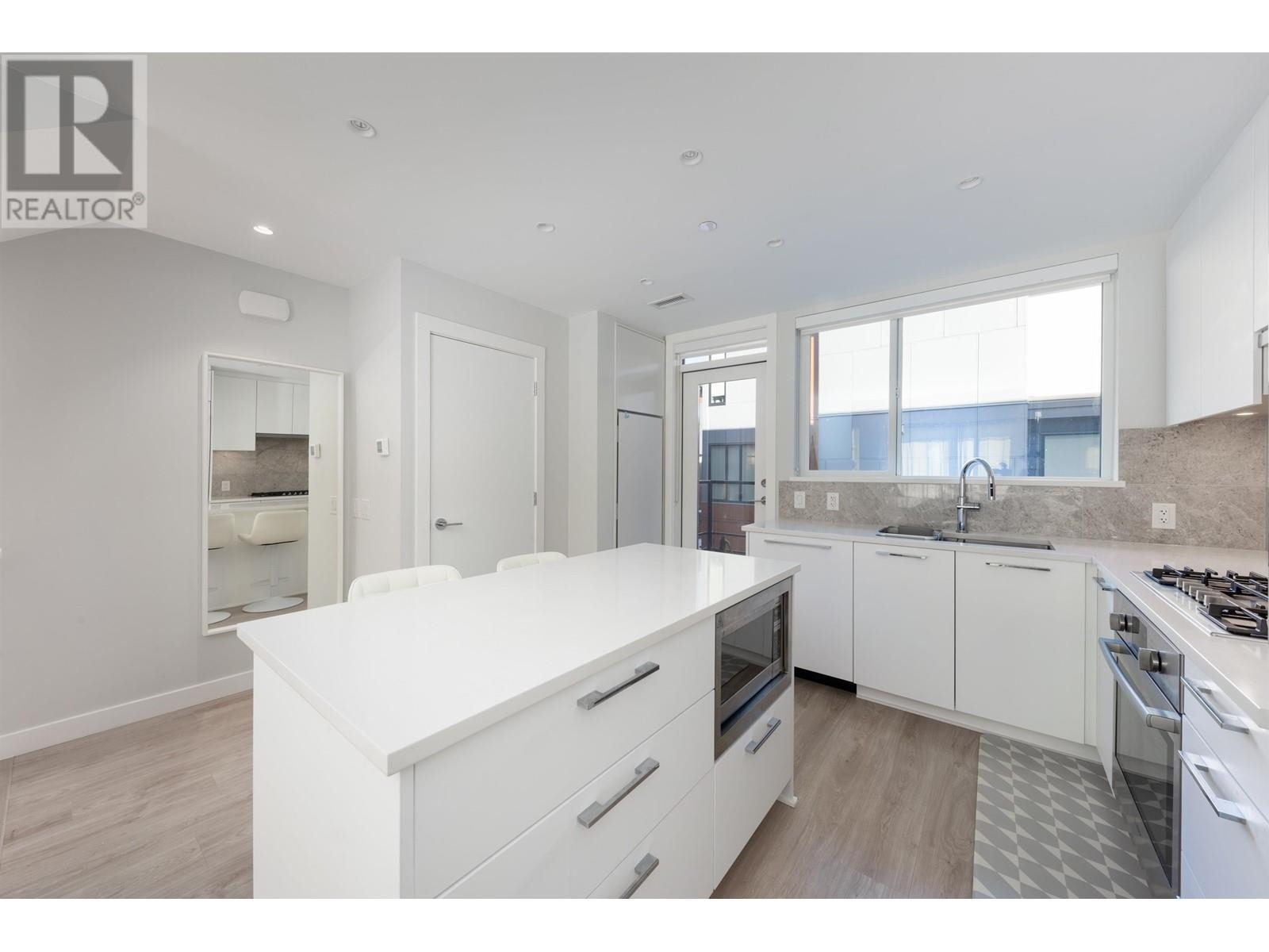 Unit 27 - 2728 Acadia Road Road, Vancouver 2
